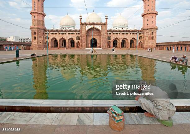 cleansing, taj-ul masajid, bhopal, india - bhopal stock pictures, royalty-free photos & images