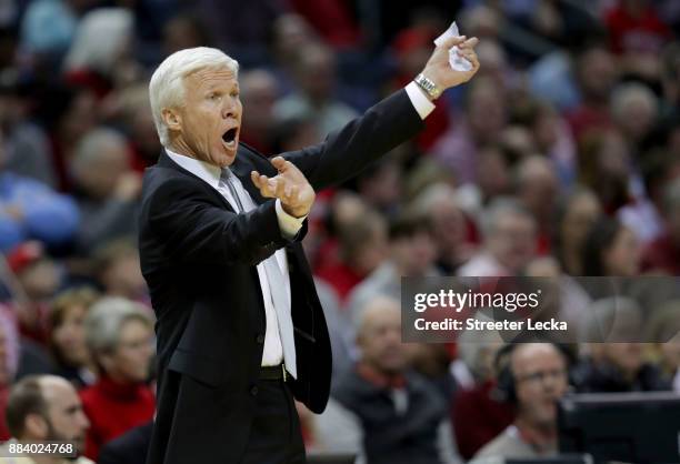 Head coach Bob McKillop of the Davidson Wildcats watches on against the North Carolina Tar Heels during their game at Spectrum Center on December 1,...