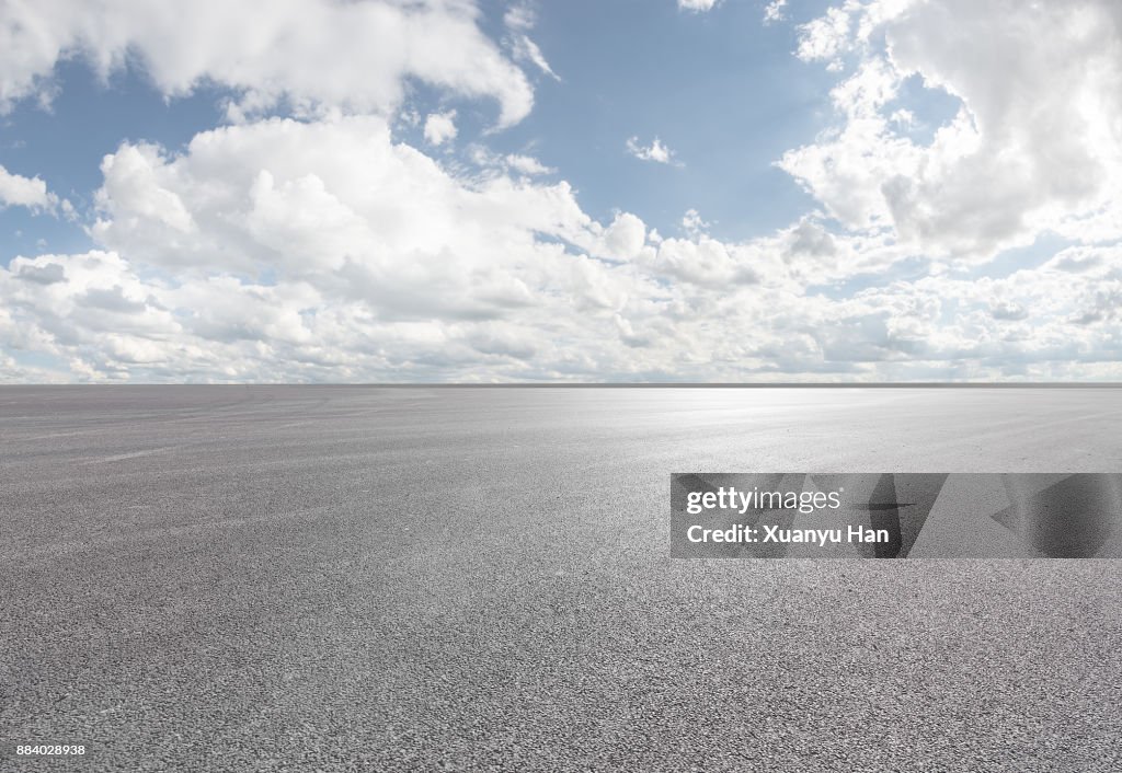 Blue sky - white clouds - Road - Professional use auto advertising backplate.