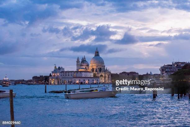 view of ponta della dogana and salutte dome at venice, italy. - canale della giudecca stock pictures, royalty-free photos & images