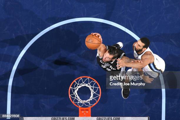 Joffrey Lauvergne of the San Antonio Spurs dunks against Brandan Wright of the Memphis Grizzlies on December 1, 2017 at FedExForum in Memphis,...