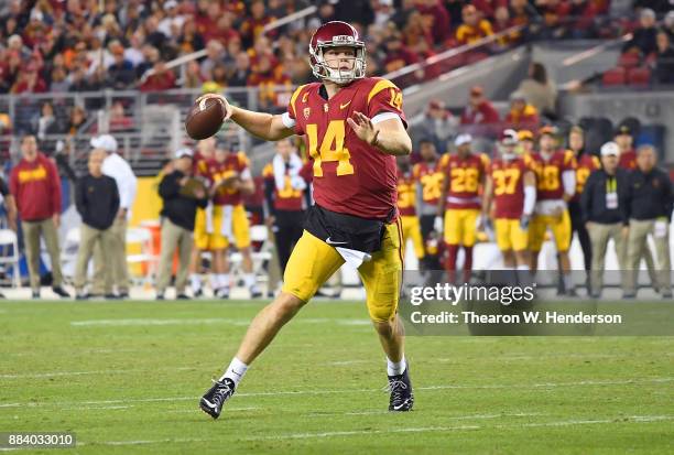 Sam Darnold of the USC Trojans looks to throw a pass against the Stanford Cardinal during the Pac-12 Football Championship Game at Levi's Stadium on...