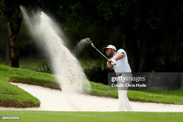 Harold Varner III plays from the bunker during day three of the 2017 Australian PGA Championship at Royal Pines Resort on December 2, 2017 in Gold...