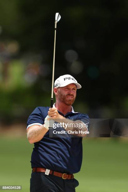 Adam Bland plays a shot during day three of the 2017 Australian PGA Championship at Royal Pines Resort on December 2, 2017 in Gold Coast, Australia.