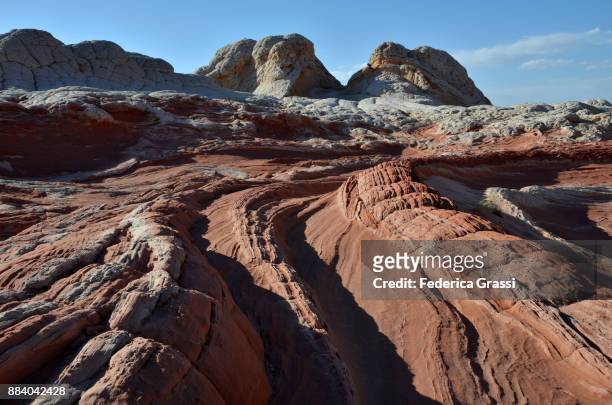 parallel grooves created by erosion at the white pocket - grooved stock pictures, royalty-free photos & images