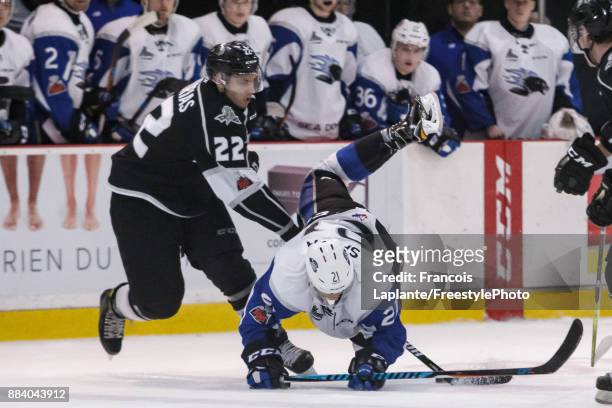 Radim Salda of the Saint John Sea Dogs falls onto the ice as Shawn Boudrias of the Gatineau Olympiques steals the puck away on December 1, 2017 at...