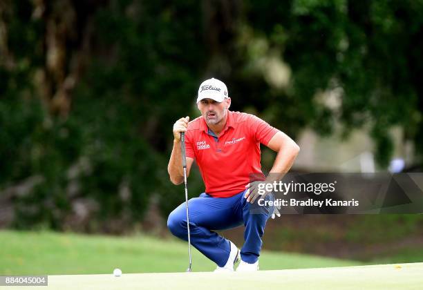 Michael Hendy of New Zealand lines up a putt on the 13th hole during day three of the 2017 Australian PGA Championship at Royal Pines Resort on...