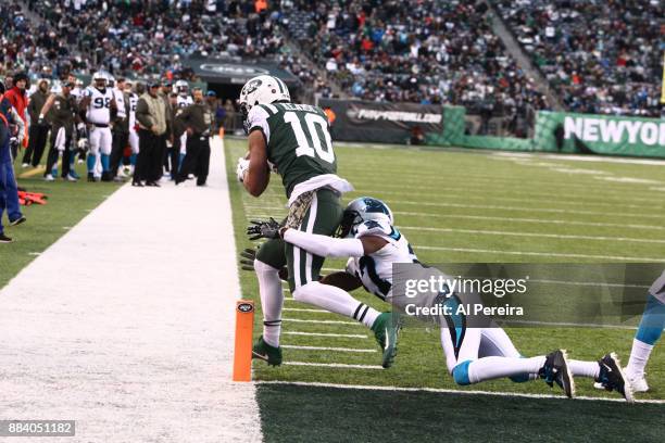Wide Receiver Jermaine Kearse of the New York Jets scores a Touchdown against the Carolina Panthers during their game at MetLife Stadium on November...