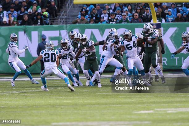 Running Back Bilal Powell of the New York Jets in action against the Carolina Panthers during their game at MetLife Stadium on November 26, 2017 in...