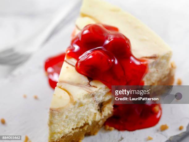 chocolate swirl cheesecake with cherry topping - cherry pie stock pictures, royalty-free photos & images