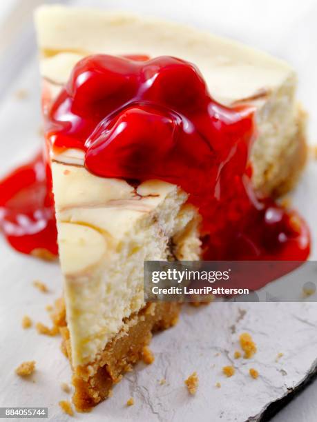 chocolate swirl cheesecake with cherry topping - cheesecake stock pictures, royalty-free photos & images