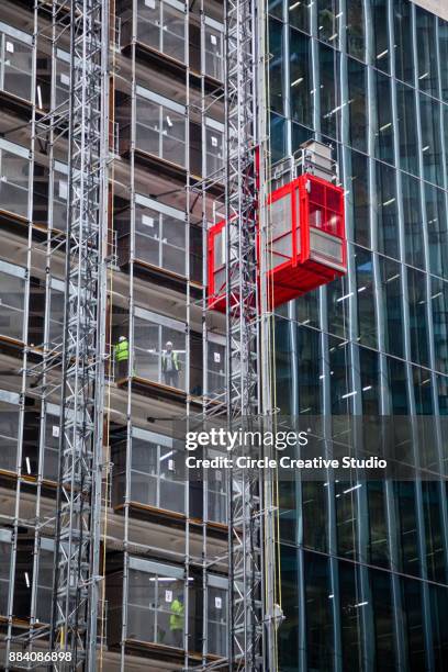 construction lift - hoist stock pictures, royalty-free photos & images