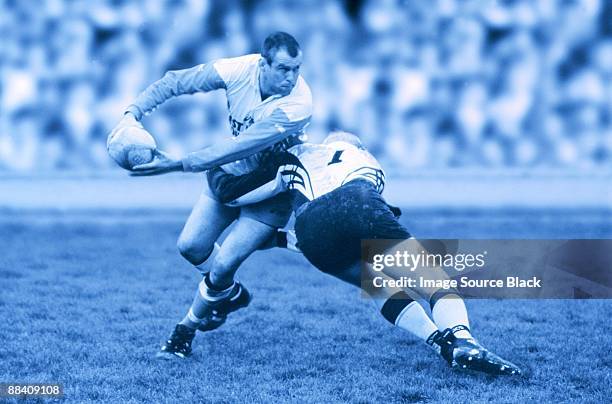 rugby tackle - liga de rúgbi fotografías e imágenes de stock