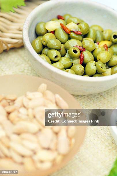 bowl of olives - mangiare stock pictures, royalty-free photos & images