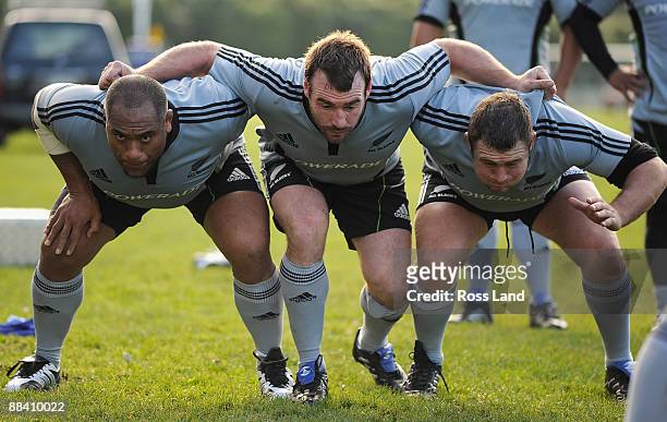 Neemia Tialata, Andrew Hore and Tony Woodcock pack a scrum during a New Zealand All Blacks training session at University Oval on June 11, 2009 in...