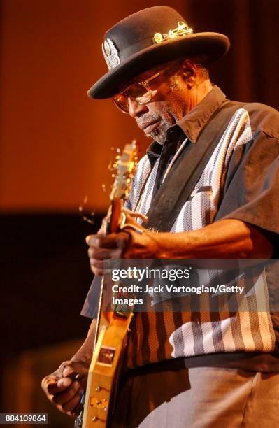 American Blues, R&B, and Rock musician Bo Diddley plays guitar with his group, the Bo Diddley Reunion Band, on the Petrillo Music Shell stage at the...
