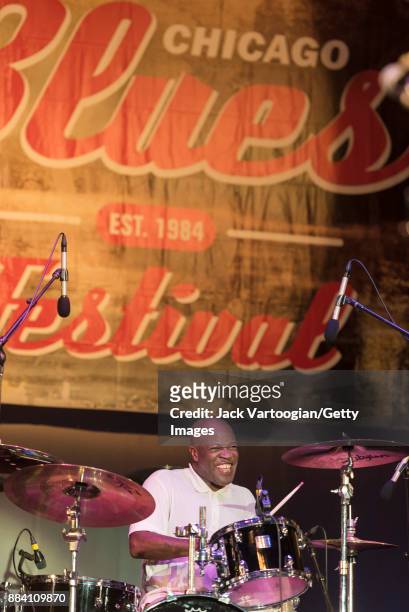 American Jazz, Blues, and Funk musician Bruce Cox plays drums as he performs with Fred Wesley and the New JBs on the Petrillo Music Shell stage at...
