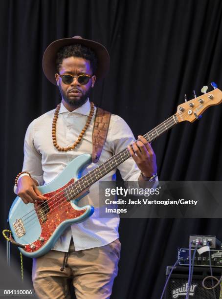 American Jazz musician Ben Williams plays electric bass guitar as he performs with Alicia Olatuja's band on the final day of the 25th Annual Charlie...