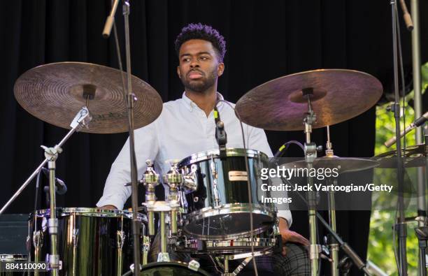 American Jazz musician Jonathan Barber plays drums as he performs with Alicia Olatuja's band on the final day of the 25th Annual Charlie Parker Jazz...