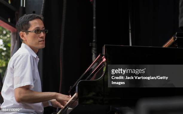 Japanese Jazz musician Toru Dodo plays piano as he performs with Alicia Olatuja's band on the final day of the 25th Annual Charlie Parker Jazz...