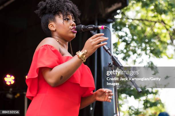 American Jazz vocalist Alicia Olatuja performs with her band on the final day of the 25th Annual Charlie Parker Jazz Festival in Tompkins Square...