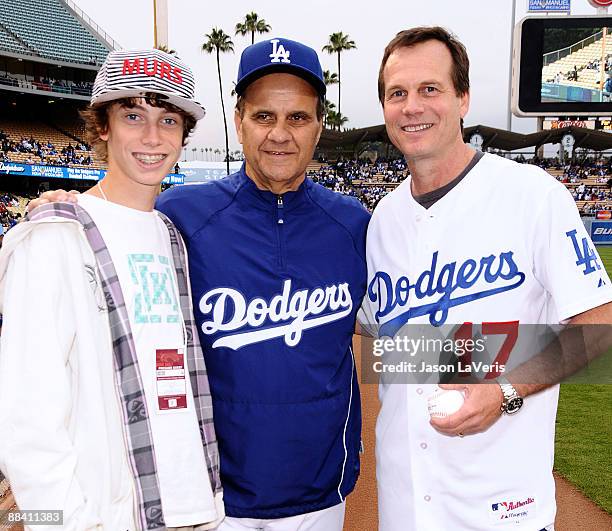 James Paxton, Dodgers manager Joe Torre and Bill Paxton on the field at Dodger Stadium on June 10, 2009 in Los Angeles, California.