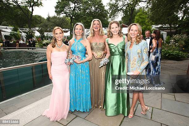 Elyssa Hellerman, Allison Morrow, Ann Unterberg, Allison Stern and Stephanie Clark attend the celebration of the snow leopards new home hosted by the...