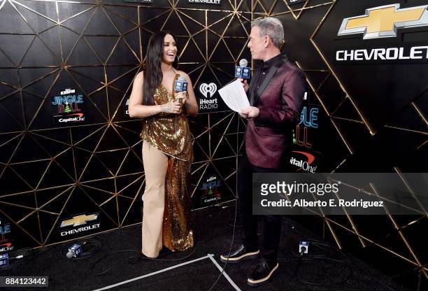 Demi Lovato and Elvis Duran speak in the press room during 102.7 KIIS FM's Jingle Ball 2017 presented by Capital One at The Forum on December 1, 2017...