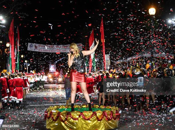 Ashlee Keating performs in the debut TV performance of "This Christmas Wish" at the West Chester, PA Christmas Parade on QVC on December 1, 2017 in...