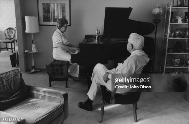 Colonel Harland David Sanders and his wife Claudia at home. Claudia plays the piano. Kentucky September 1974
