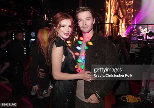 Bella Thorne and Patrick Schwarzenegger attend 102.7 KIIS FM's Jingle Ball 2017 presented by Capital One at The Forum on December 1, 2017 in...