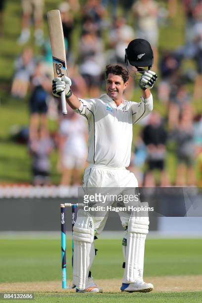 Colin de Grandhomme of New Zealand celebrates his maiden test century during day two of the Test match series between New Zealand Blackcaps and the...