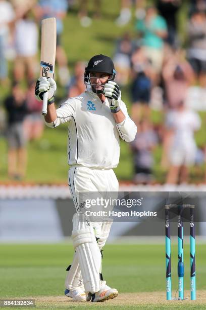 Colin de Grandhomme of New Zealand celebrates his maiden test century during day two of the Test match series between New Zealand Blackcaps and the...