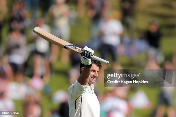 Colin de Grandhomme of New Zealand celebrates his maiden test century during day two of the Test match series between New Zealand Blackcaps and the...