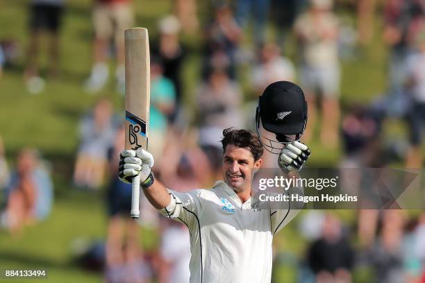 Colin de Grandhomme of New Zealand celebrates his maiden test century during day two of the Test match series between New Zealand Blackcaps and the...