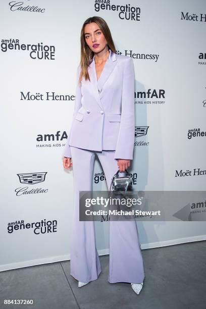 Alina Baikova attends the 2017 amfAR generationCURE holiday party at the Cadillac House on December 1, 2017 in New York City.