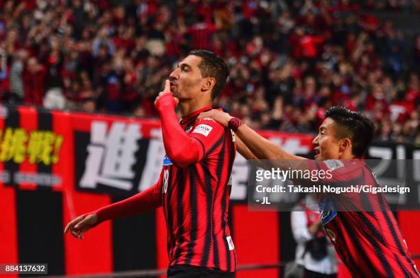Jay Bothroyd of Consadole Sapporo celebrates scoring the opening goal with his team mate Ken Tokura during the J.League J1 match between Consadole...