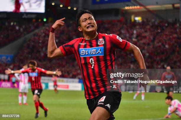 Ken Tokura of Consadole Sapporo celebrates scoring his side's second goal during the J.League J1 match between Consadole Sapporo and Sagan Tosu at...