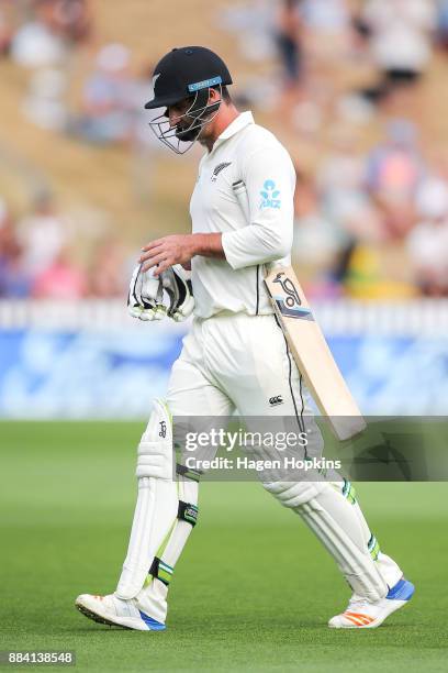 Colin de Grandhomme of New Zealand leaves the field after being dismissed during day two of the Test match series between New Zealand Blackcaps and...