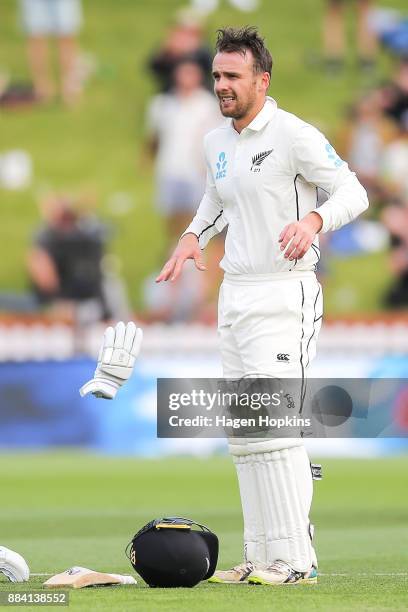 Tom Blundell of New Zealand takes a break from batting during day two of the Test match series between New Zealand Blackcaps and the West Indies at...