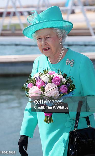 Queen Elizabeth II visits the National Weymouth Sailing Academy at Weymouth Harbour, where the Royal party viewed the Olympic facilities which are...