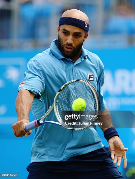 James Blake of USA plays a backhand during the men's third round match against Sam Querrey of USA during Day 3 of the the AEGON Championship at...