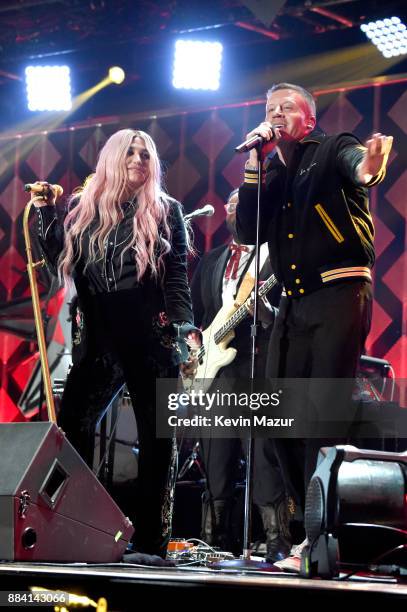 Kesha and Macklemore perform onstage during 102.7 KIIS FM's Jingle Ball 2017 presented by Capital One at The Forum on December 1, 2017 in Inglewood,...