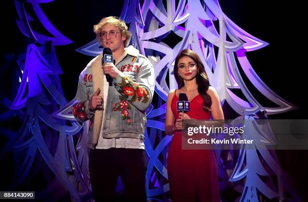 Logan Paul and Sarah Hyland speak onstage during 102.7 KIIS FM's Jingle Ball 2017 presented by Capital One at The Forum on December 1, 2017 in...