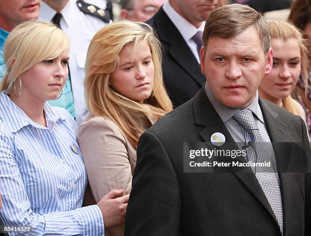 George Kinsella , father of murdered schoolboy Ben Kinsella, stands with his daughters Brooke , Jade and Georgia outside the Old Bailey on June 11,...