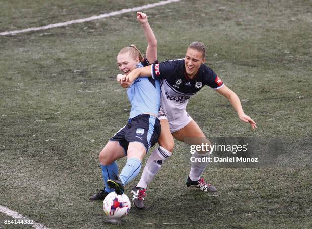 Elizabeth Ralston of Sydney FC fights fot the ball against Laura Spiranovic of Melbourne during the round six W-League match between Sydney FC and...