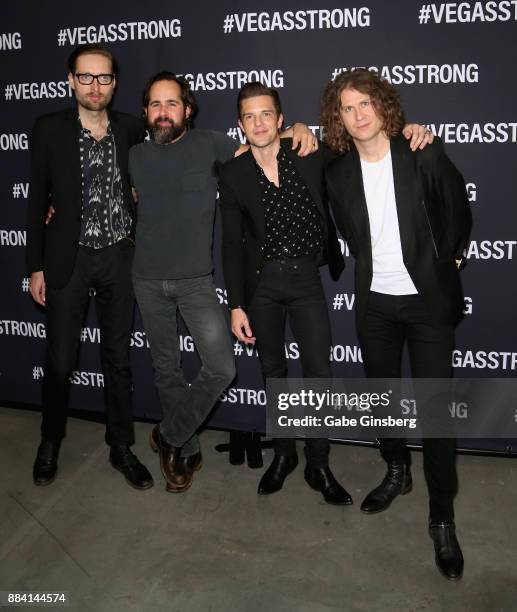 Bassist Mark Stoemer, drummer Ronnie Vannucci Jr., singer Brandon Flowers and guitarist Dave Keuning of the Killers attend the Vegas Strong Benefit...
