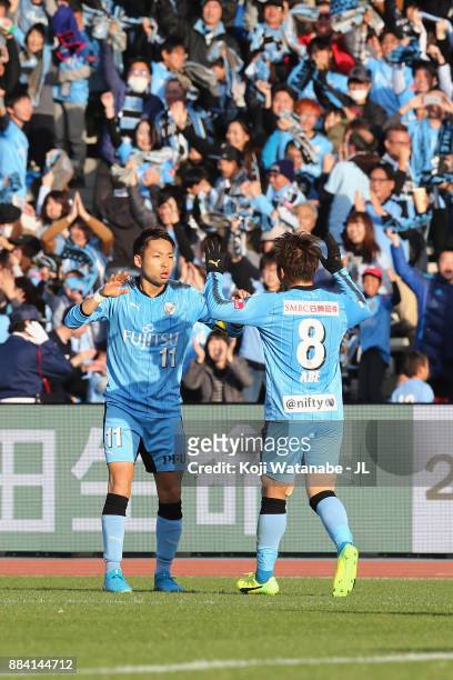 Yu Kobayashi of Kawasaki Frontale celebrates scoring his side's second goal with his team mate Hiroyuki Abe during the J.League J1 match between...