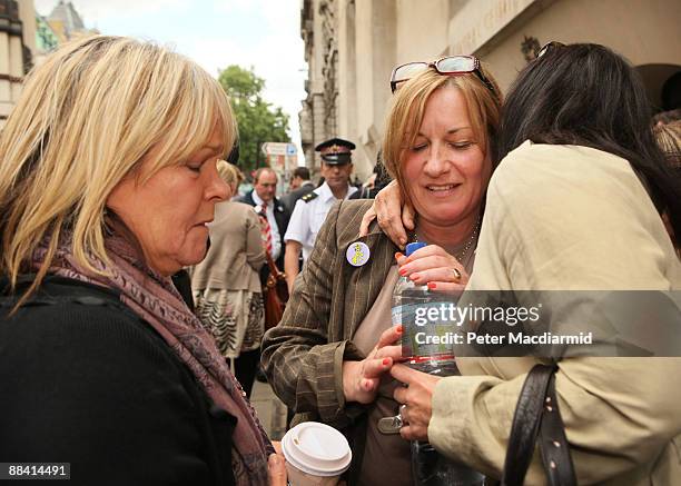 Deborah Kinsella , mother of murdered school boy Ben Kinsella, is consoled by a friend outside the Old Bailey as actress Linda Robson looks on on...