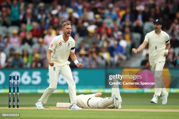 Stuart Broad of England celebrates the run out of Cameron Bancroft of Australia by Chris Woakes of England during day one of the Second Test match...